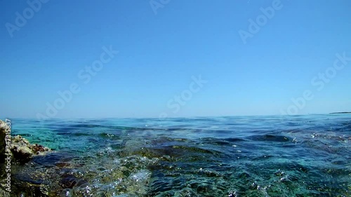 Underwater view through the clear sea water and Mediterranean Sea landscape