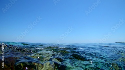 Underwater view through the clear sea water and Mediterranean Sea landscape