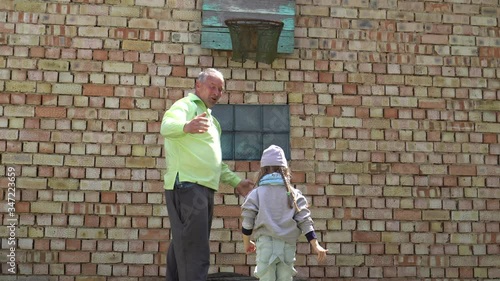 Wallpaper Mural Little girl playing with grandfather. Torontodigital.ca