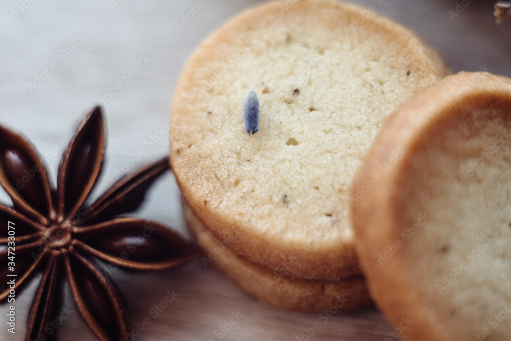 Aromatic lavender cookies, handmade. French cuisine. Shortbread cookies on light wooden background. Selective focus Aromatic lavender cookies, handmade. French cuisine. Shortbread cookies on light wooden background. Selective focus