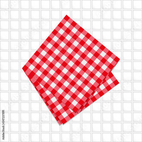 The checkered tablecloth on white background