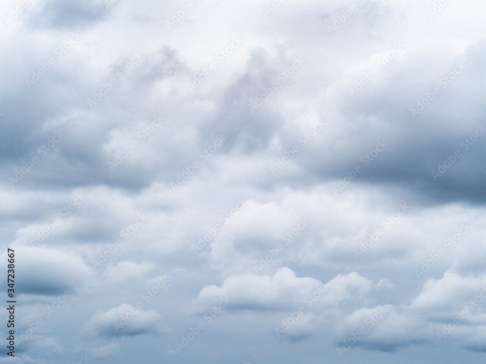 natural background - many rainy clouds in gray sky on spring cloudy day natural background - many rainy clouds in gray sky on spring cloudy day