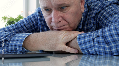 Sad Elderly Person Isolated in Quarantine at Home Looking Bored and Disappointed to a Cell Phone