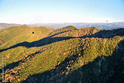 hot air balloon over the mountains