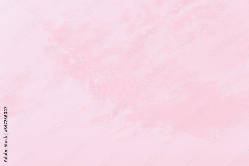 Pastel delicate pink background with a marble pattern