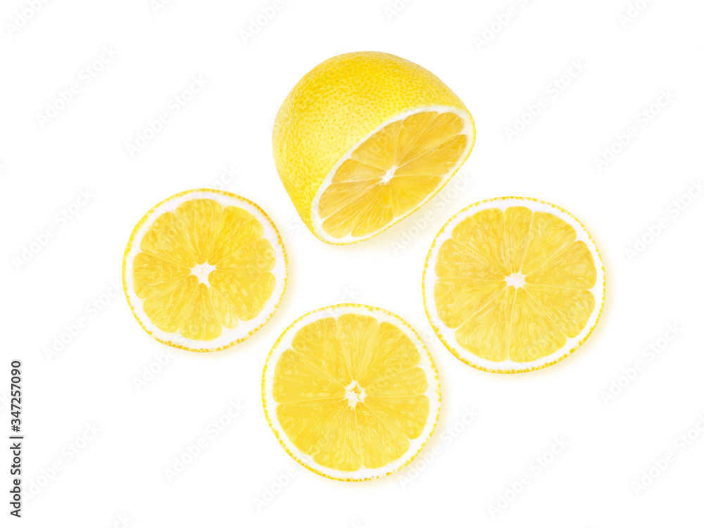 Bright juicy lemon on a white background with three round slices. Includes clipping path. Bright juicy lemon on a white background with three round slices. Includes clipping path.