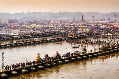 General view of pontoon bridges over the Ganges river at the Kumbh Mela Festival, the largest religious gathering on the planet, in Allahabad, Uttar Pradesh, India. photo