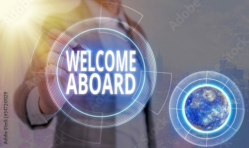 Conceptual hand writing showing Welcome Aboard. Concept meaning Expression of greetings to an individual whose arrived is desired Elements of this image furnished by NASA photo