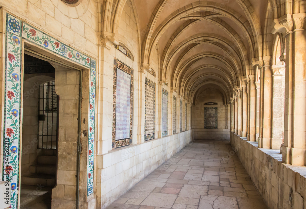 JERUSALEM, ISRAEL - January 30, 2020; The gothic corridor of atrium in Church of the Pater Noster on Mount of Olives. Israel.