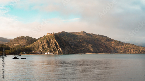 Maroccan meditarrean coast with castle photo