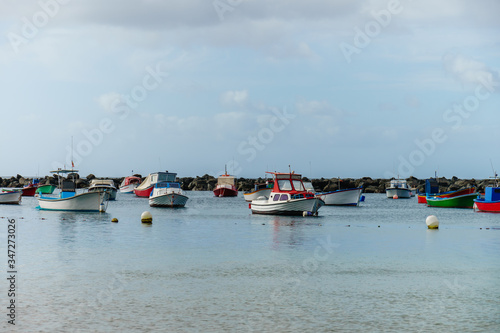 Fishing boats in the small harbor of the resort city of Puerto de la Cruz