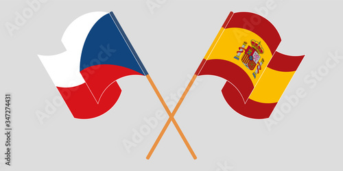 Crossed and waving flags of Czech Republic and Spain