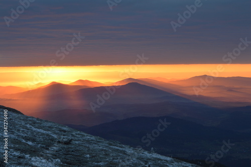 Red sunrise in the mountains. Babia Gora Poland. © Tomek