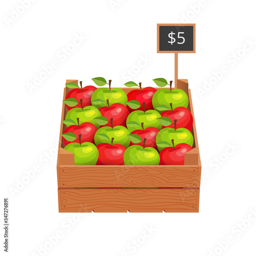 Wooden box with ripe apples