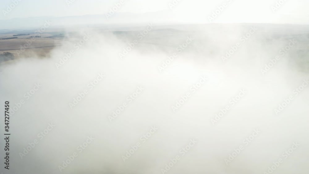 Orbiting Shot of Fog with an Amazing View Below of Vast Horizon Orbiting Shot of Fog with an Amazing View Below of Vast Horizon