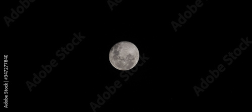 full moon over black