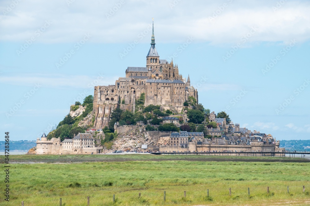 A close-up view of Mont Saint-Michel against the backdrop of the sea