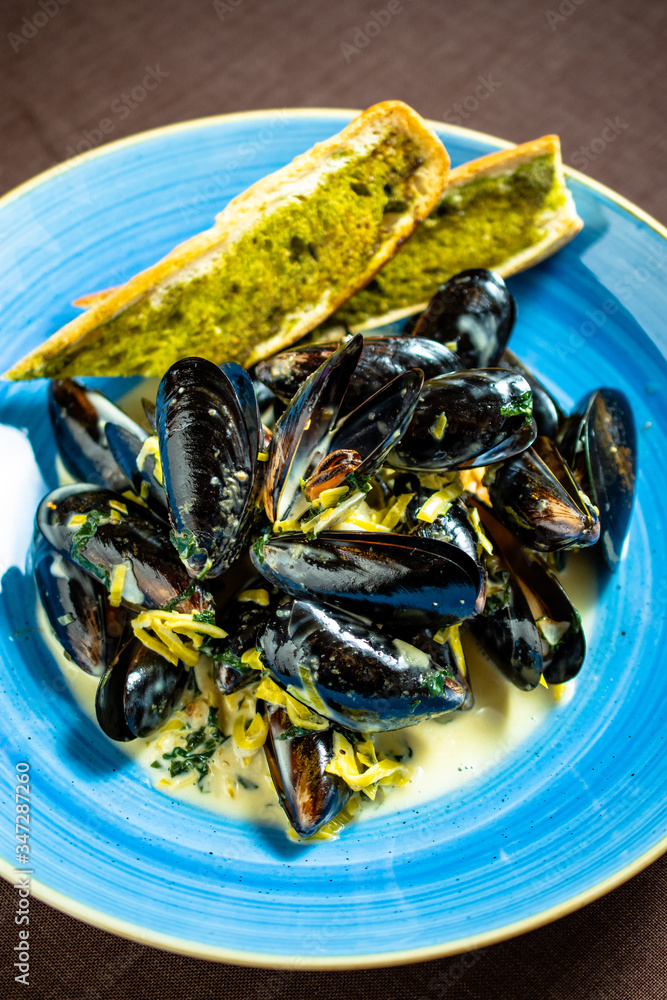 Mussels with home cooked garlic bread and sauce Mussels with home cooked garlic bread and sauce