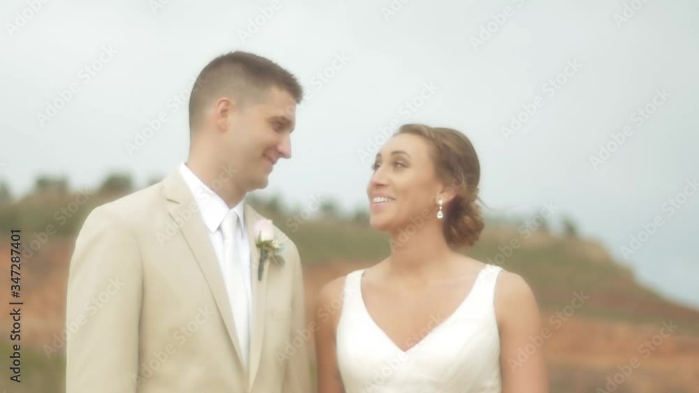 Shot of a loving newlywed couple smiling and gazing at each other Shot of a loving newlywed couple smiling and gazing at each other