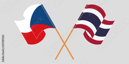 Crossed and waving flags of Czech Republic and Thailand