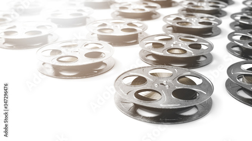 3D rendering of movie reels on a white surface