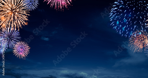 night sky with fireworks , new years background.