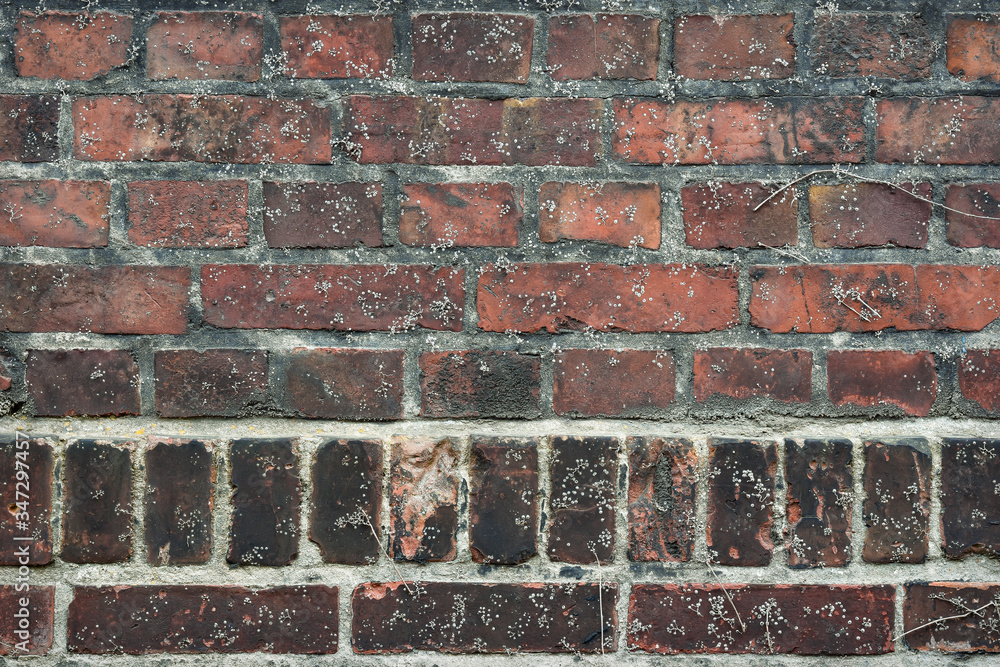 Fototapeta premium Urban architecture, old red brick wall background