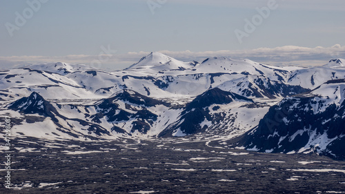 Snow covered mountain tops in springtime in Iceland. © DanielFreyr
