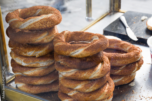 Simit is a Turkish loop-shaped bread, encrusted with sesame seeds, Cracknel and Gevrek