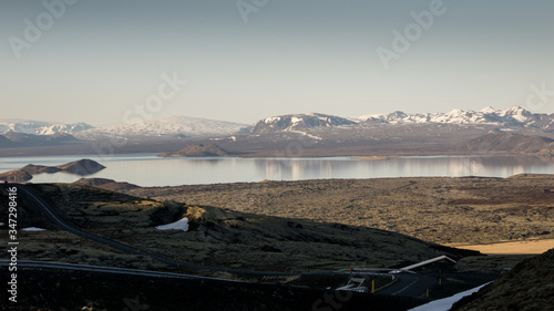 Sunset view over Lake Thingvallavatn, a National Park just outside of Reykjavík, Iceland. Seen from Nesjavallaleið (Road 435).  The large Skjaldbreid shield volcano seen in the distance.  photo