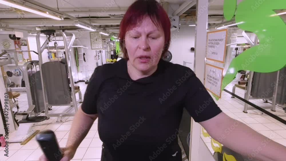 A lady sweating out in the gym in Finland A lady sweating out in the gym in Finland