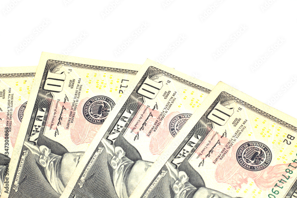 Ten dollar bills isolated on white background close-up Ten dollar bills isolated on white background close-up