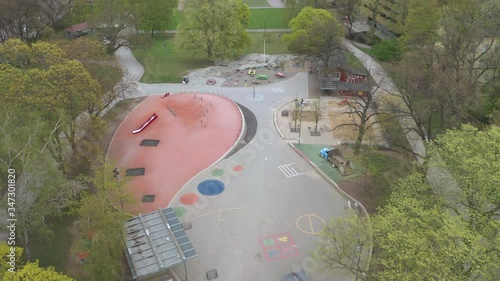 Aerial view of empty abandoned playground in a park during Covid-19 Coronavirus pandemic outbreak photo