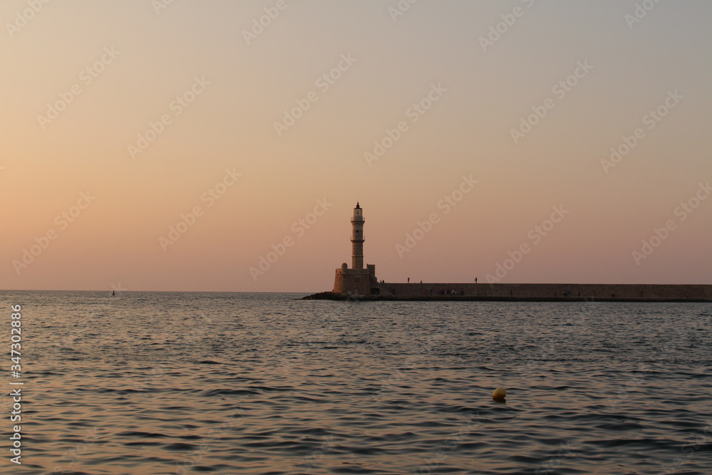 Lighthouse in the old Venetian Harbor of Chania, in Crete Island, Greece. Lighthouse in the old Venetian Harbor of Chania, in Crete Island, Greece.