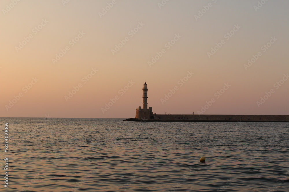 Lighthouse in the old Venetian Harbor of Chania, in Crete Island, Greece.