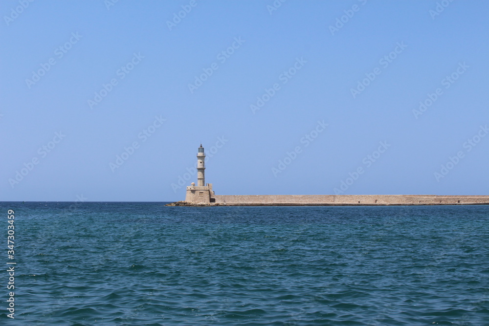 Lighthouse in the old Venetian Harbor of Chania, in Crete Island, Greece.