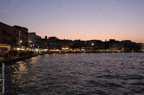 A view of old Venetian Harbor of Chania with historical buildings in Crete Island, Greece.