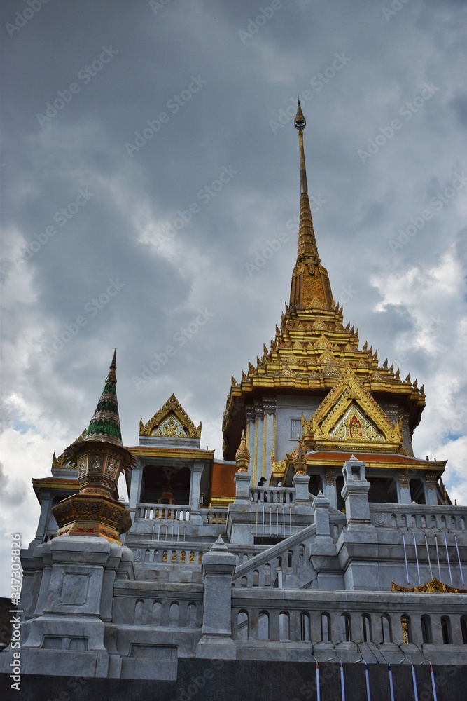 Thailand, Wat Traimit in Bangkok is considered to be a rather modest temple. The temple is known for housing a 5.5-tonne statue of a seated Buddha.