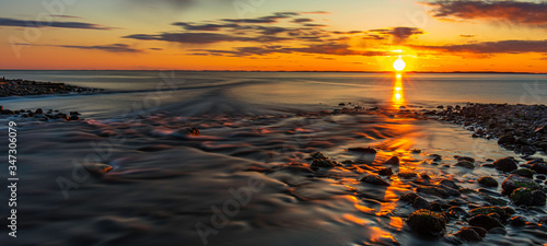 Fotografija River Flowing into Bay of Fundy at Sunset
