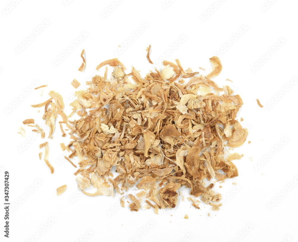 Dried Minced Onions on a White Background. Onion flakes isolated on white background.