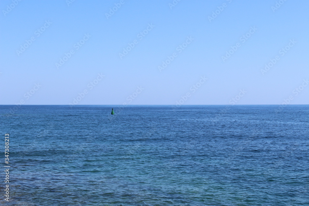 Blue Mediterranean sea horizon in a sunny day in Chania, Crete Island, Greece.