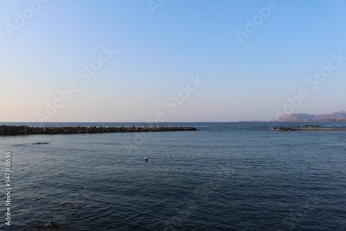 Blue Mediterranean sea horizon in a sunny day in Chania, Crete Island, Greece. © RukiMedia