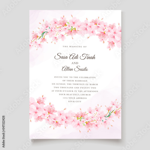 elegant wedding invitation design with cherry blossom template © lukasdedi