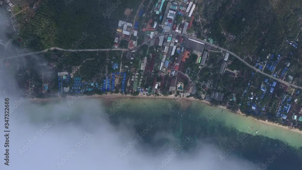 Top Down Drone Video through Clouds Ko Tao, Ko Pha-ngan District, Surat Thani, Thailand Top Down Drone Video through Clouds Ko Tao, Ko Pha-ngan District, Surat Thani, Thailand