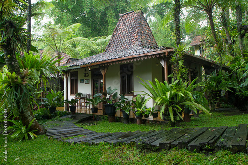 traditional javanese joglo house or rumah joglo photo