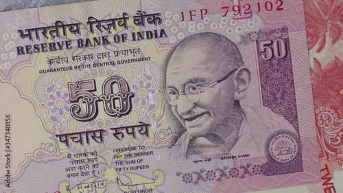 Wallpaper Mural 
Mahatma Gandhi, Portrait from India 50 Rupees  Banknotes. India money. India Banknote. Closeup Collection. rotating banknote Torontodigital.ca