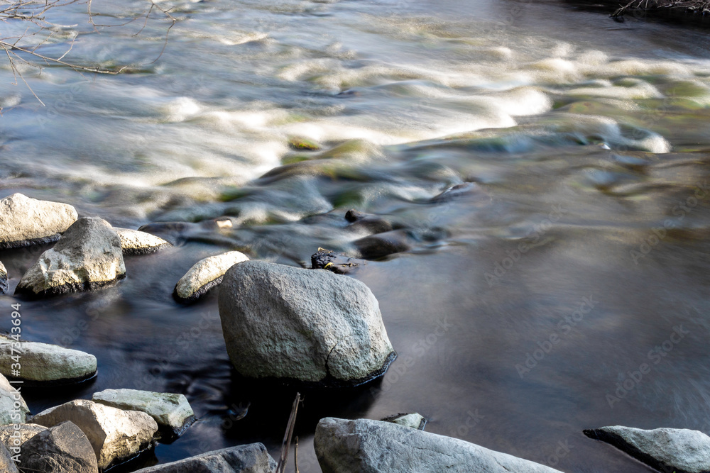 Fototapeta premium Stones in Water Long Exposure