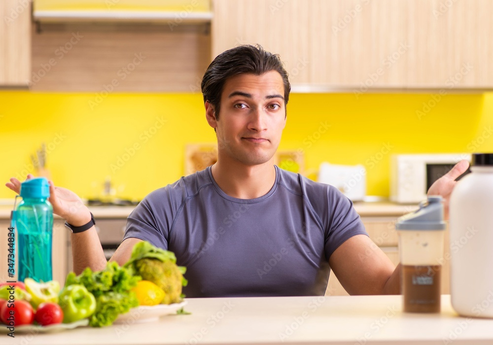 Young man in healthy eating concept Young man in healthy eating concept
