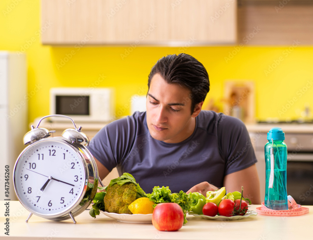 Young man in dieting and healthy eating concept Young man in dieting and healthy eating concept