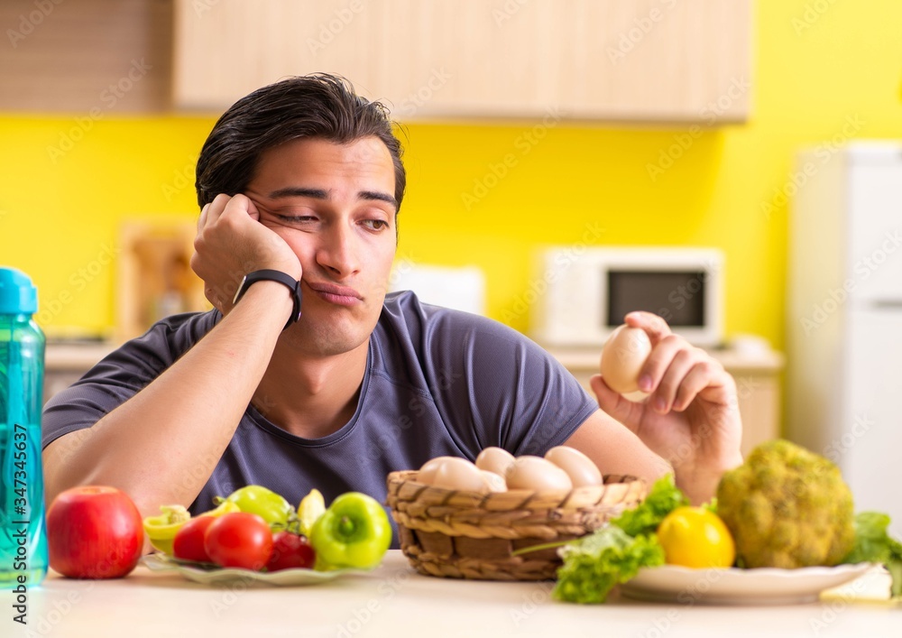 Young man in dieting and healthy eating concept Young man in dieting and healthy eating concept